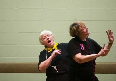 
Joan Frank, left, and Gena Bradford, members of the Tap Grandmas perform a 