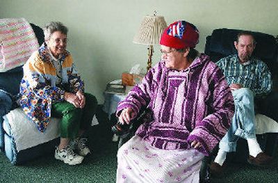 
SNAP Ombudsman Edwes Wille visits with Marilyn Rosie and Richard Stickler at Carol's Care Adult Home in the Spokane Valley.
 (J. BART RAYNIAK / The Spokesman-Review)