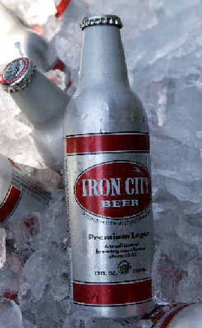
New aluminum beer bottle is unveiled on Tuesday. 
 (Associated Press / The Spokesman-Review)