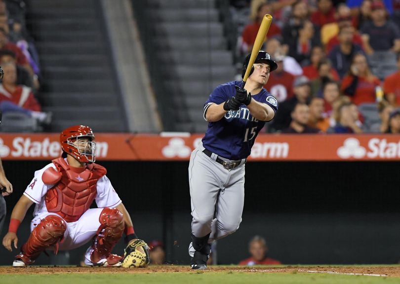 Third baseman Kyle Seager and his Mariners teammates are watching the scoreboard a lot in September. (Mark J. Terrill / Associated Press)