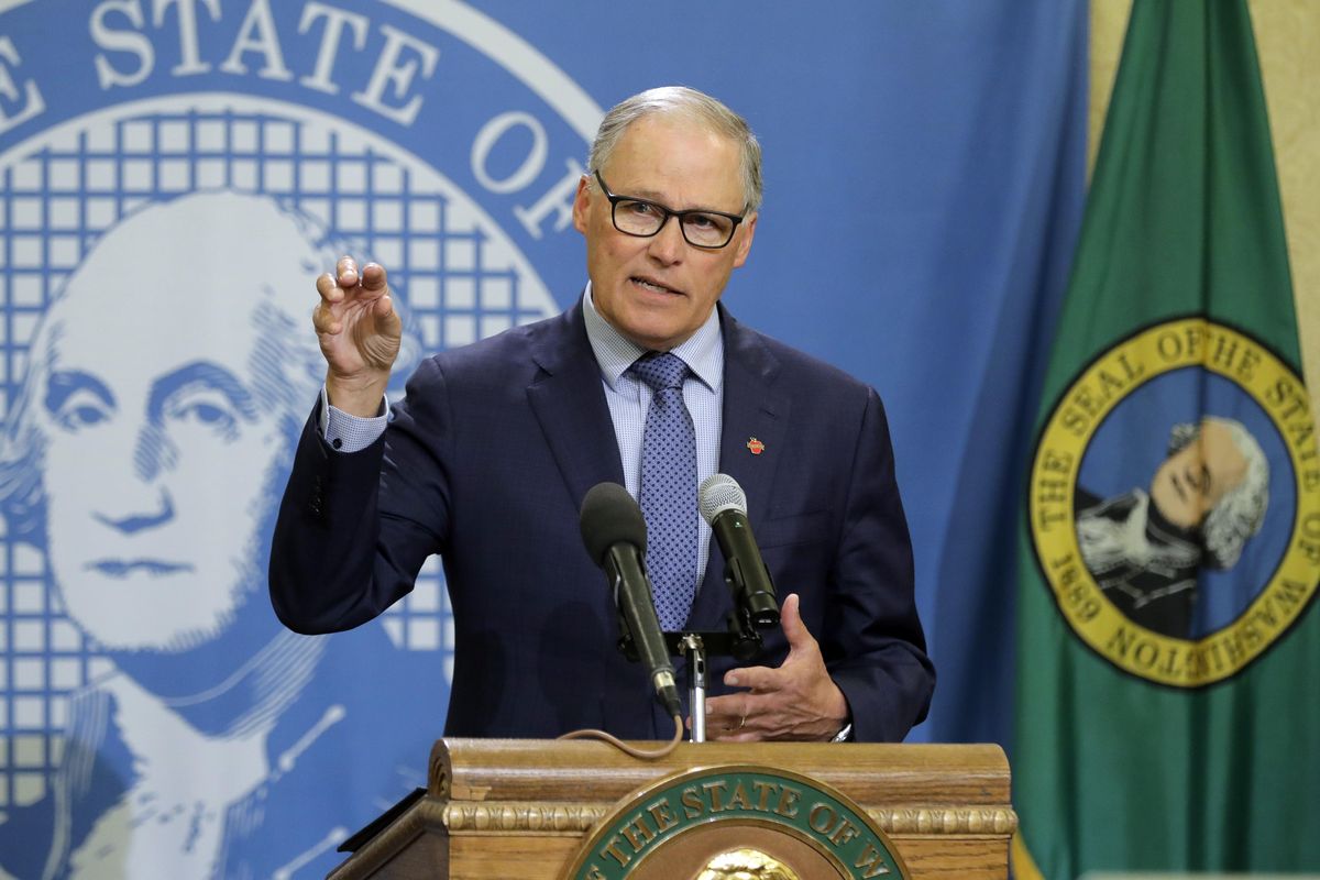 Gov. Jay Inslee has launched a large contact tracing initiative as Washington moves toward a phased reopening. Increased testing plans are in the works. (Ted S. Warren / AP)