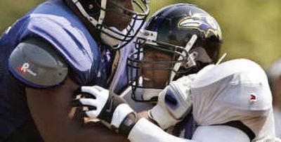 
Baltimore's Ray Lewis, right, is expected to miss Sunday's game.  Associated Press
 (Associated Press / The Spokesman-Review)