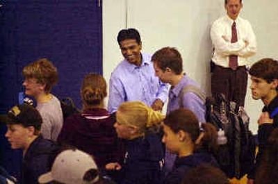 
Sujo John, a survivor of the terrorist attack on the World Trade Center, greets Jenkins High School students after telling his story in an assembly Tuesday. Sujo John, a survivor of the terrorist attack on the World Trade Center, greets Jenkins High School students after telling his story in an assembly Tuesday. 
 (John Craig/John Craig/ / The Spokesman-Review)