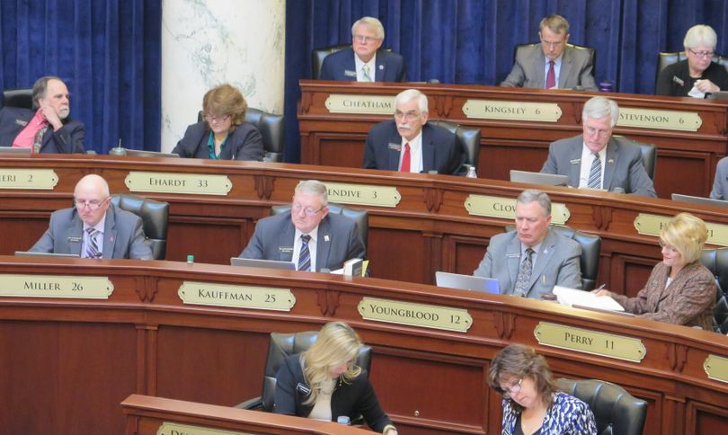 Rep. Don Cheatham, R-Post Falls, at top center, considers bills in the Idaho House on Tuesday, March 20, 2018, along with other House members. (Betsy Z. Russell / SR)