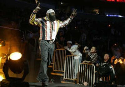 
Mixed martial arts fighter Kimbo Slice walks to the cage during the Strikeforce mixed martial arts event in San Jose, Calif., in March. CBS will begin airing full matches of the sport on Saturday. Associated Press photos
 (Associated Press photos / The Spokesman-Review)
