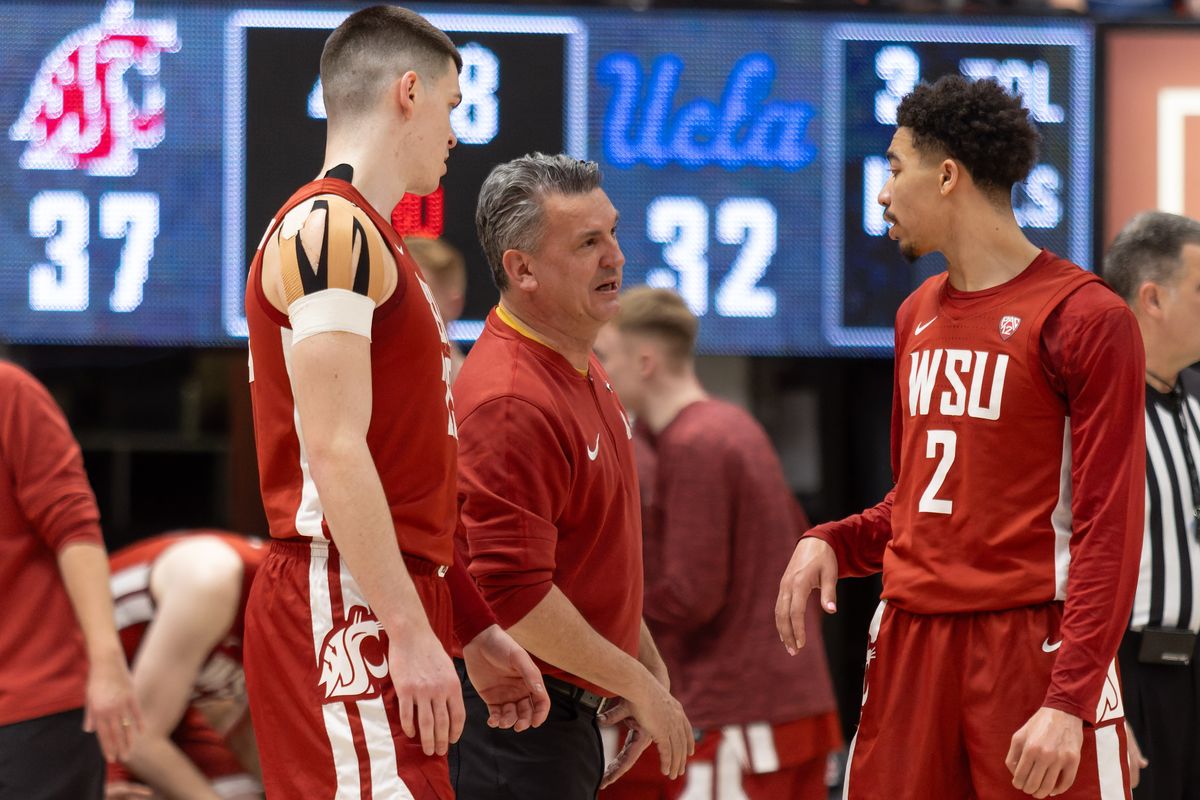 Washington State head coach Kyle Smith talks with forward Andrej Jakimovski, left, and guard Myles Rice in the first half of a game against UCLA on Saturday, March 2, 2024, at Beasley Coliseum in Pullman.  (Geoff Crimmins/For The Spokesman-Review)