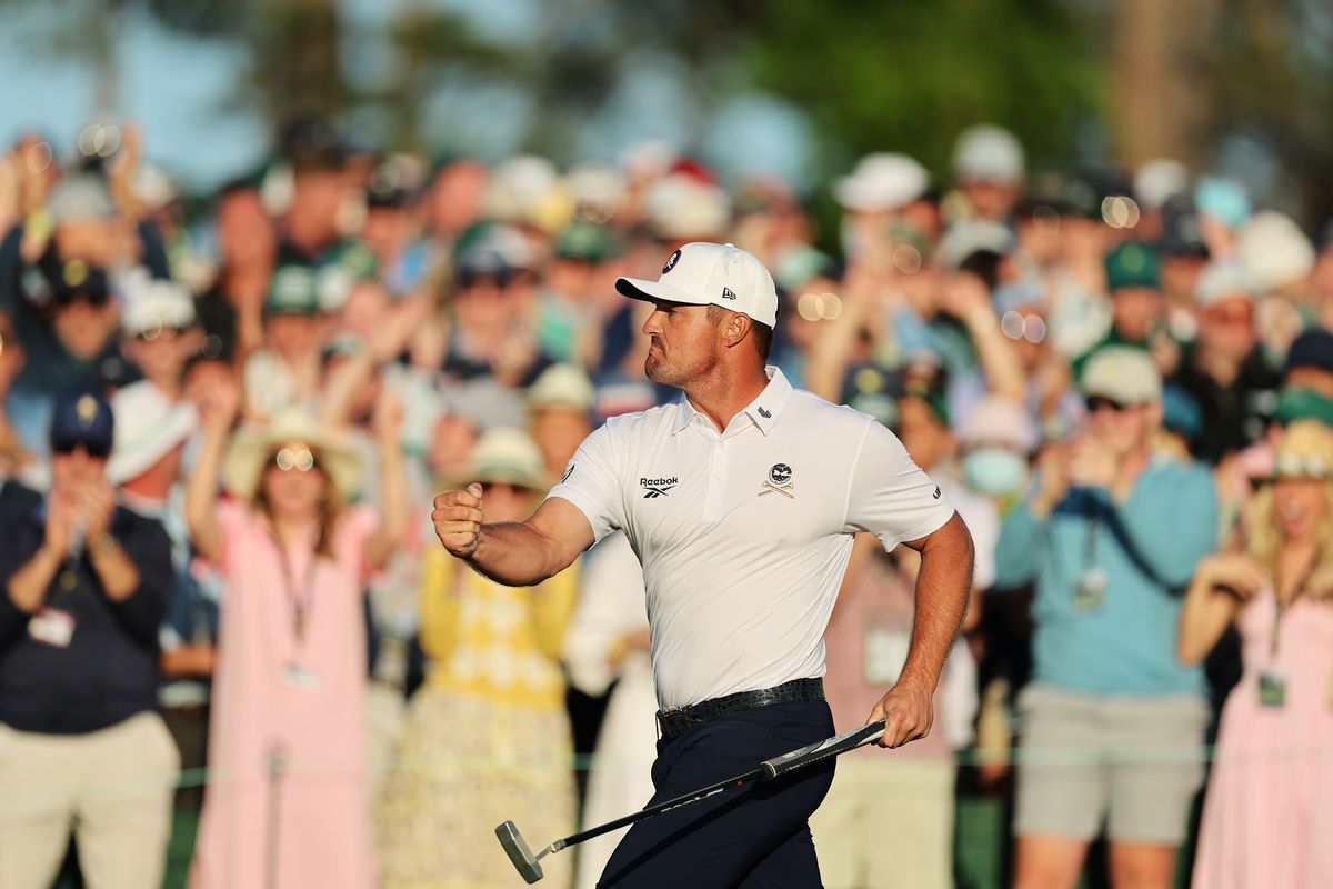 Bryson DeChambeau reacts after hitting a lengthy birdie putt on the 18th green, drawing to two shots back of leader Rory McIlroy ahead of the final round of the Masters Tournament on Saturday at Augusta National Golf Club in Augusta, Ga.  (Getty Images)