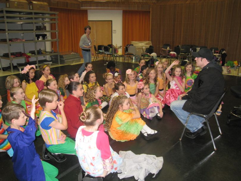 John Travolta, speaking to the cast of Munchkins in the Coeur d'Alene Summer Theatre's 