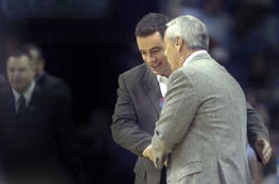 
Cougars coach Tony Bennett, left, greets North Carolina coach Roy Williams before Thursday's East Regional semifinal at Charlotte, N.C. 
 (Christopher Anderson / The Spokesman-Review)
