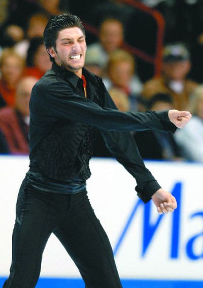
Evan Lysacek celebrates after capping his first-place showing in Championship Men's free skate at the U.S. Figure Skating Championships. 
 (Dan Pelle / The Spokesman-Review)