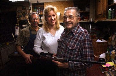 
From right, Al Biesen, with his granddaughter Paula Biesen-Malicki and son Roger, have a international reputation for the firearms they customize in Spokane. 
 (Brian Plonka / The Spokesman-Review)