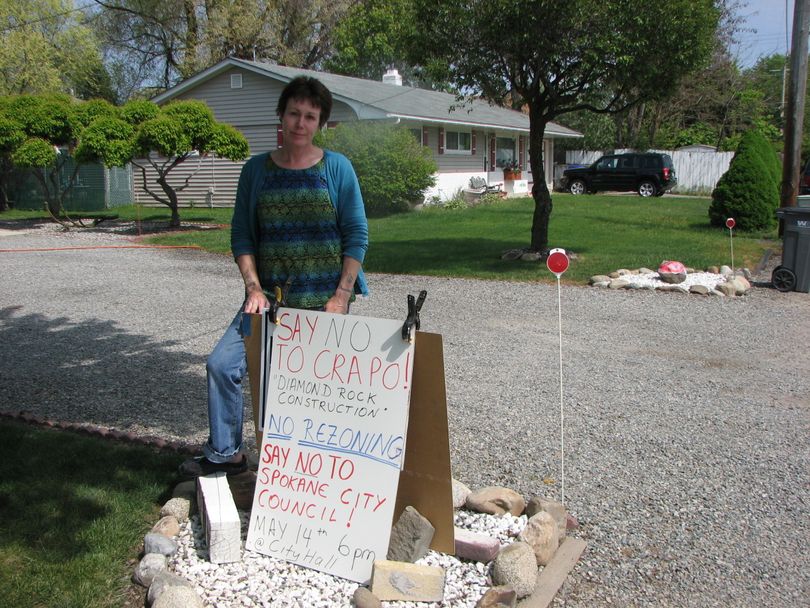 Nina Fluegal, who lives on Fourth Avenue off Evergreen Road, handed out more than 200 fliers trying to rally neighbors against a rezoning request filed by builder Dennis Crapo.  (Pia Hallenberg)