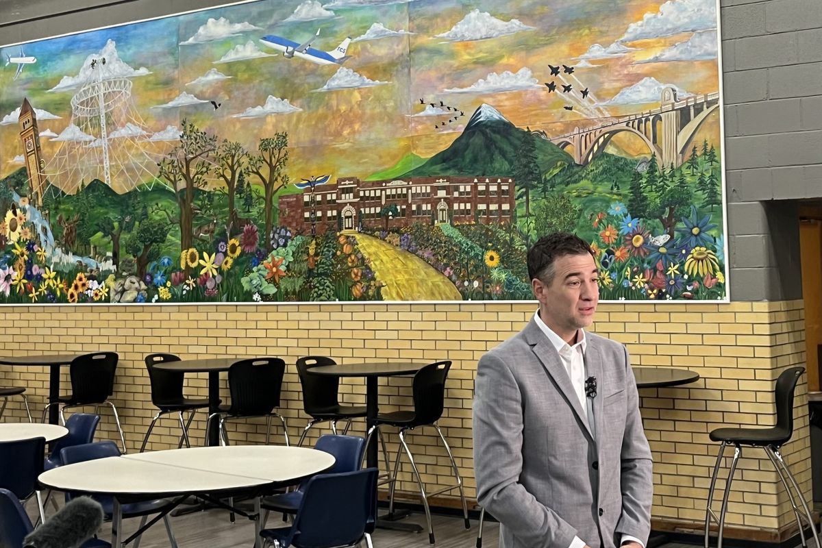 Spokane Public Schools Superintendent Adam Swinyard speaks to reporters March 11, 2025 about the district’s consolidation plan at the Community School. The plan includes selling or leasing the Community School building at 1025 W. Spofford Ave. and moving the school into a shared space with district administration. (Elena Perry)