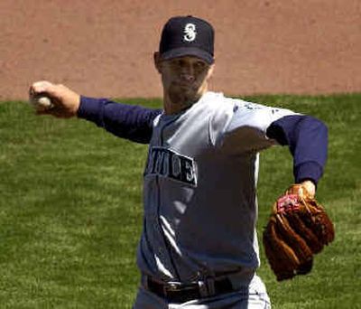 
Seattle's Aaron Sele pitches in the fifth inning Wednesday against the Kansas City Royals. 
 (Associated Press / The Spokesman-Review)