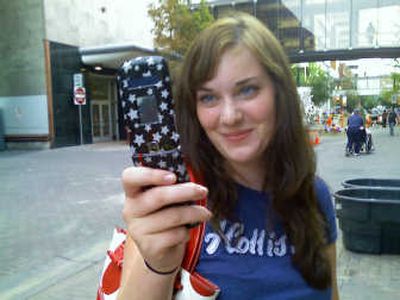 
Megan Hasquet, of Shelby, Mont., tries out the Teleprint service in downtown Spokane. Photo by Doug Dobbins
 (Photo by Doug Dobbins / The Spokesman-Review)