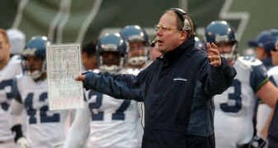 
Seattle Seahawks coach Mike Holmgren insists getting into the playoffs would be an accomplishment despite his team's disappointing record in the regular season.
 (Associated Press / The Spokesman-Review)