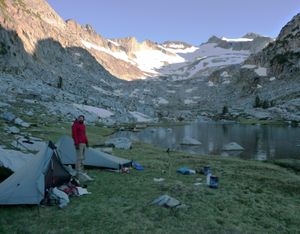 Robin Johnson breaks camp in the Sierra-Nevada Range at Donahue Pass during his 2012 trek to log 2,661-miles on the Pacific Crest Trail from Mexico to Canada. (Frank Johnson)