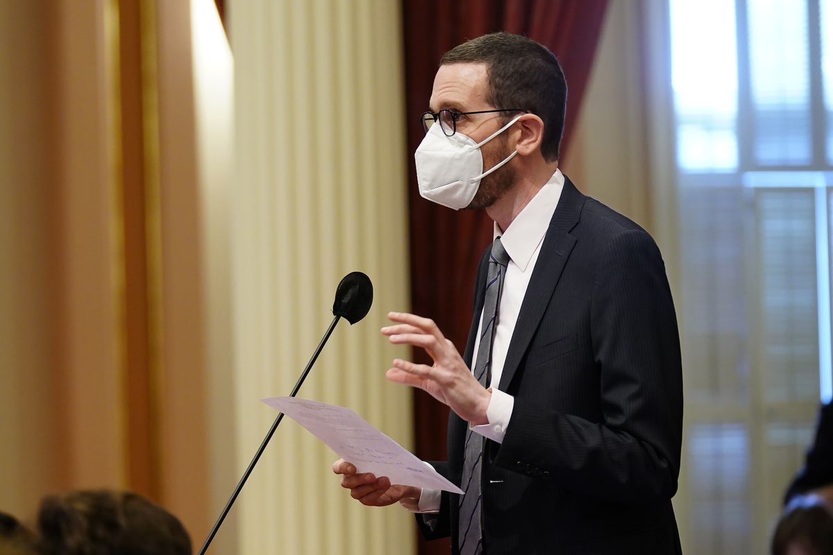State Sen. Scott Wiener, D-San Francisco, addresses the state Senate at the Capitol in Sacramento, Calif., Tuesday, Jan. 18, 2022. Wiener is introducing, Friday, Jan. 21, 2022 a bill that would allow children ages 12 and up to be vaccinated without their parents consent.  (Rich Pedroncelli)