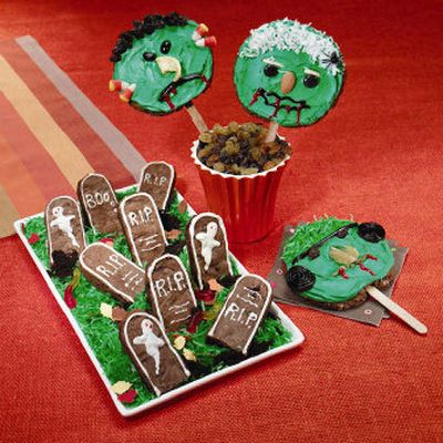 
Goofy Green Monster Cookie Pops and Tombstone Brownies made ghoulishly good treats.
 (Jolly Time and Sun-Maid Growers. / The Spokesman-Review)