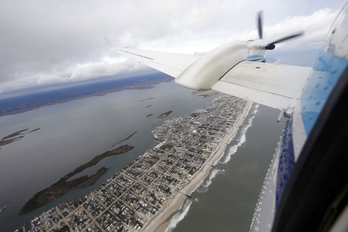 The King Air plane flies over coastal New Jersey during a National Oceanic and Atmospheric Administration flight to document coastal changes after Superstorm Sandy, Thursday, Nov. 1, 2012. (Alex Brandon / Associated Press)