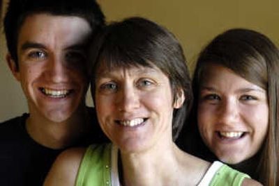 
Kathy Belisle and two of her three children, Andrew, 17 and Jessica, 16, have decided the teens are too busy for summer jobs. 
 (Jed Conklin / The Spokesman-Review)