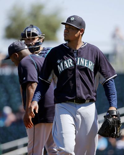 Seattle Mariners ace Felix Hernandez, right, struggled mightily in his last spring-training start – an 8-6 loss to the Cleveland Indians. (Associated Press)