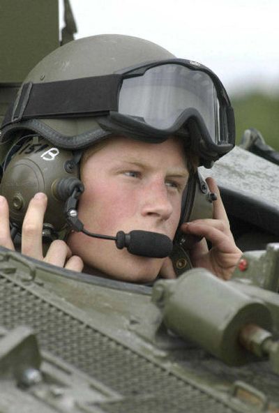 
 Prince Harry  is shown in a Spartan armored reconnaissance vehicle in July. 
 (File Associated Press / The Spokesman-Review)