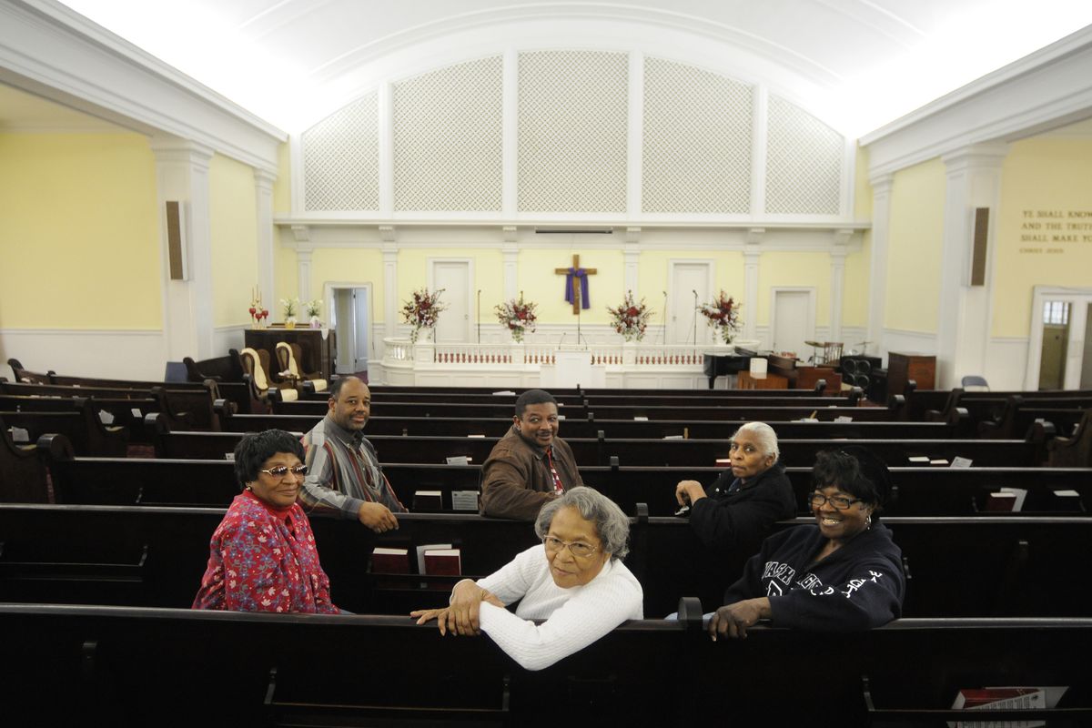 Members of the Holy Temple Church of God in Christ are looking for community help to fix up their historic church. Seated in front are Gladys Howard, Violet Noble and Emma Sumler. In back are Jesse Austin, Marvin White and Pearl Shines. (Colin Mulvany)