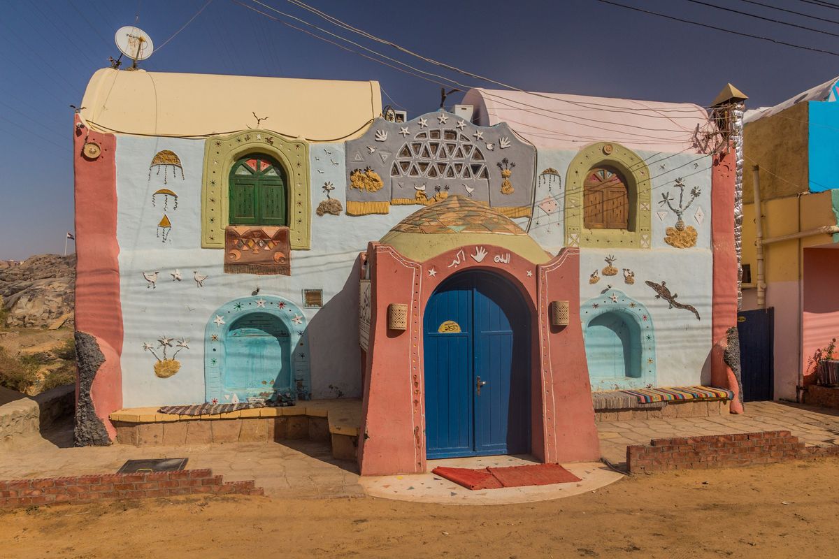 The brightly painted homes of Gharb Suhayl, Egypt, give the area the feel of a living outdoor museum. This home is shown in February 2019.  (Dreamstime)