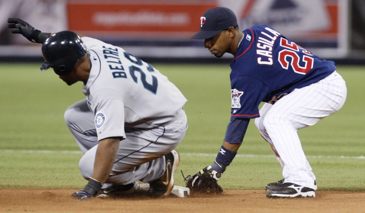 Mariners’ Adrian Beltre arrives at second base with a double.  (Associated Press / The Spokesman-Review)
