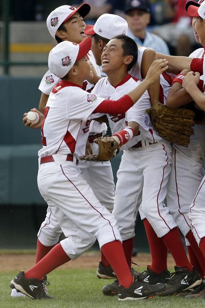 The Tokyo team celebrates after beating Chula Vista, Calif., for the Little League World Series championship. (Associated Press)
