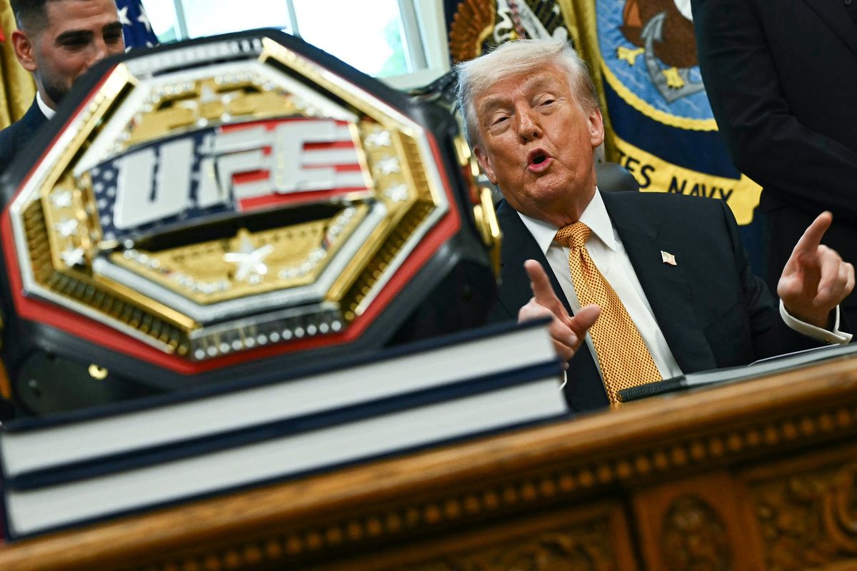 A UFC championship belt is displayed as President Donald Trump speaks about the coming "UFC Freedom 250" event, in the Oval Office of the White House on May 6, 2026, in Washington, D.C. (Kent Nishimura/AFP/Getty Images/TNS) (KENT NISHIMURA/AFP/Getty Images North America/TNS)
