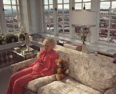 
Helen Paulsen sits in the sunroom with a panoramic view of Spokane in this 1997 photo. 
 (File / The Spokesman-Review)