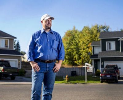 Daniel Montgomery of Coeur d'Alene is photographed on Tuesday on Kaleigh Court in Coeur d'Alene, where he shot five handgun rounds into a vehicle earlier this year. Montgomery feared for his life, the safety of his family and the lives of others on the street the driver of the vehicle drove recklessly down the street and around a cul-de-sac, almost hitting Montgomery after he confronted the driver. (Jake Parrish / Coeur d'Alene Press)