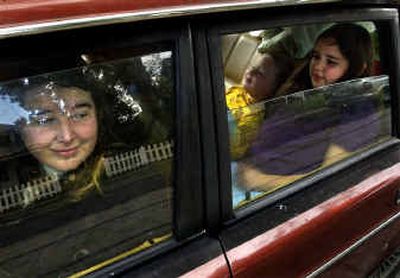 
Erin Winterheimer, 31, and her children, Crystal McClenahan, 10, and Brian McClenahan, 8, lived in their car for nine days  until they found shelter at Anna Ogden Hall. 
 (Jed Conklin / The Spokesman-Review)