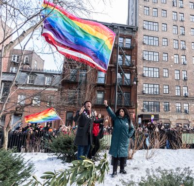 After elected officials raised a Pride flag on a temporary flagpole, activists raise the flag on the permanent flagpole at the Stonewall National Monument in New York City Feb. 12, 2026. Thousands gathered at the monument to see the flag raised after President Donald Trump had ordered the flag to be removed earlier in the week.  (Seth Harrison/The Journal News)