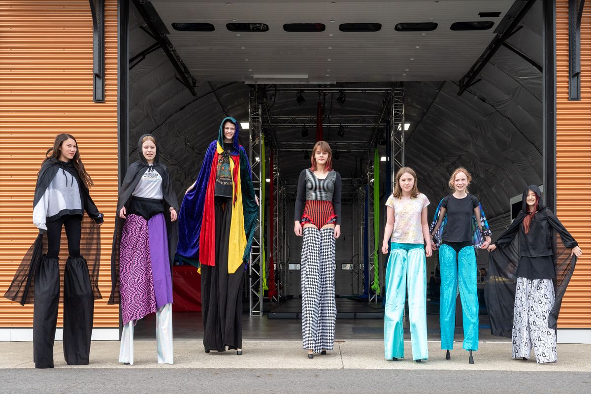 Members of the youth stilt-walking class at Spokane Aerial Performance Arts will appear in the Junior Lilac Parade on May 13. From left are Sophia Dwyer, 12, Quinn Seidel, 12, Eden Warren, 13, Jenna Lowe, 13, Penelope Cook, 11, Liv Donaldson, 11, and Aurora Simmons, 9. Spokane Aerial Performance Arts has offered stilt-walking classes for kids and adults since 2011. A grant from Spokane Arts allowed them to purchase 14 new sets of stilts.  (COLIN MULVANY/THE SPOKESMAN-REVIEW)