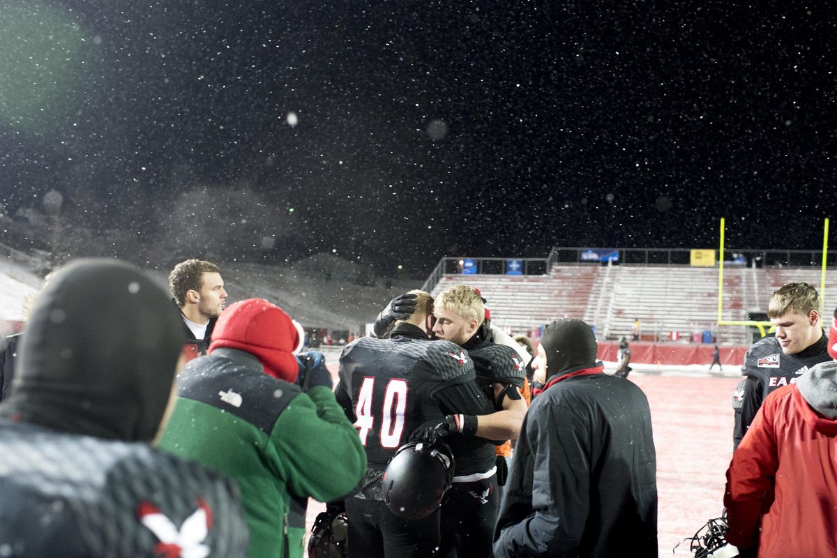 Eastern Washington  wide receiver Cooper Kupp  embraces brother  Ketner Kupp (40) after a Dec. 17, 2016, game against  Youngstown State  at Roos Field in Cheney. (Tyler Tjomsland / The Spokesman-Review)