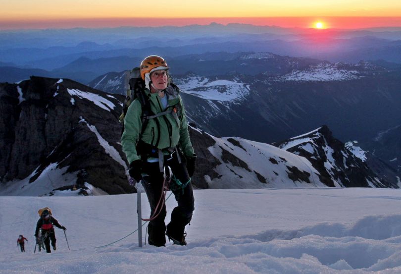In a July 9, 2010 photo, Sally Jewell, CEO of REI, leads a five-woman team up the Emmons Glacier and ultimately to the top of Mt. Rainier as the sun rises. President Barack Obama has picked Jewell, a business executive who has earned national recognition for her support of outdoor recreation and habitat conservation, to lead the Interior Department, the White House said Wednesday, Feb. 6, 2013. (Associated Press)