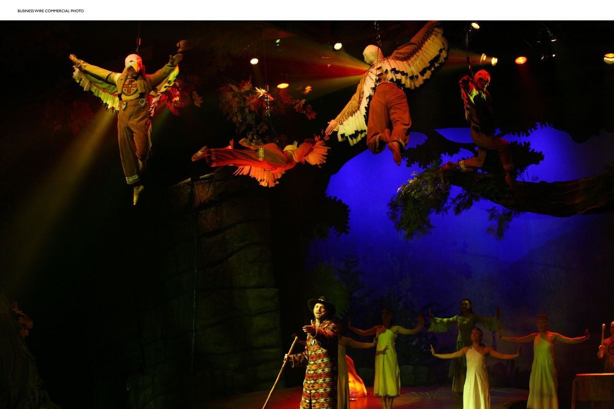 Left: Eagle warriors fly over the audience of Sha-Kon-O-Hey!, Dollywood’s new musical featuring eight new songs by Dolly Parton. “Sha-Kon-O-Hey! celebrates the wonderful people, music and proud heritage of the spectacular Smoky Mountains,” she says. Parton, above, still performs occasionally. (Curtis Hilbun / The Spokesman-Review)