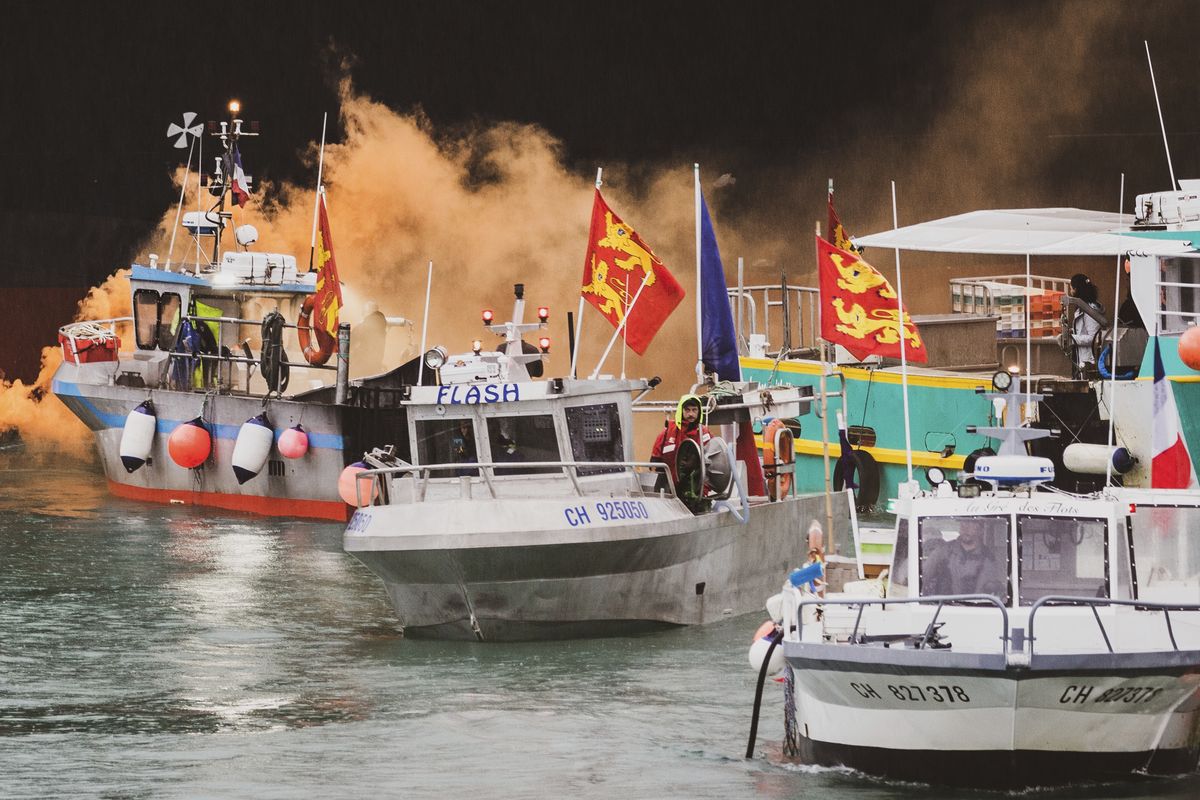 Fishing vessels at sea off the coast of Jersey, Thursday, May 6, 2021. French fishermen angry over loss of access to waters off their coast have gathered their boats in protest off the English Channel island of Jersey. The head of a grouping of Normandy fishermen said about 50 boats from French ports joined the protest Thursday morning and gathered their fleet off the Jersey port of St. Helier.  (Oliver Pinel)