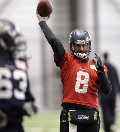 Seattle Seahawks quarterback Matt Hasselbeck throws during NFL football practice Tuesday, Jan. 4, 2011, in Renton, Wash. The Seahawks host the New Orleans Saints on Saturday in an NFC wild card game. (Elaine Thompson / Associated Press)