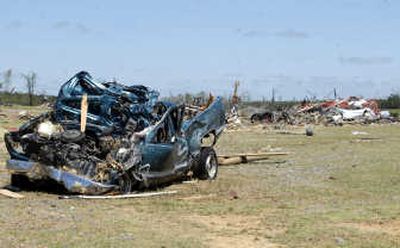 
A truck mangled by a tornado sits in a field Saturday near Damascus, Ark.  Eleven Arkansas counties have been declared disaster areas.
 (The Spokesman-Review)