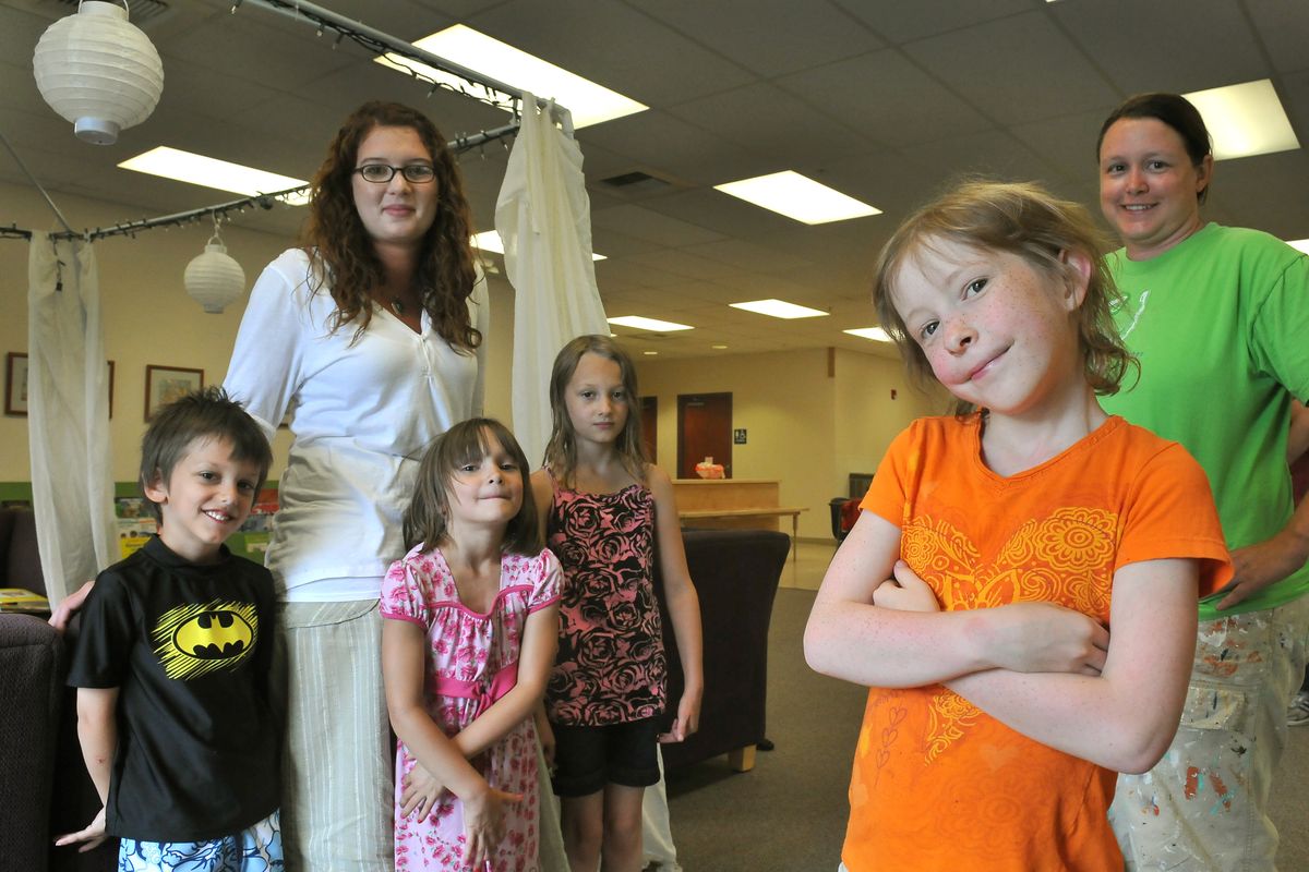 Teachers Bri Gallaway, second from left, and Nicole Simon, right, stand with some of their future students, from left, Owen Williams, 5, Addie Williams, 5, Talia Williams, 8, and Mirabai Karasu, 9, at River Day School, a new private school formed by concerned parents after Discovery School closed.