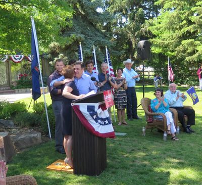 Idaho 1st District Rep. Raul Labrador embraces his wife, Becca, as family members and supporters applaud, on May 30, 2017, at his announcement that he’ll run for governor in 2018. Labrador held the announcement in the backyard of his wife’s childhood home. (Betsy Z. Russell)
