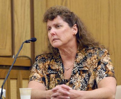 Julie Harmia testifies  Tuesday at Kevin Coe’s civil commitment trial about the night she was raped by Coe in 1980.  (Jesse Tinsley / The Spokesman-Review)