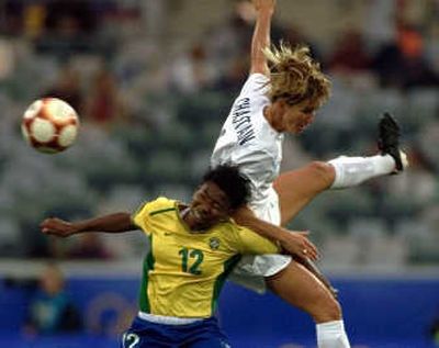 
When Brandi Chastain, top, played in the WUSA, she said team budgets were not always realistic. Associated Press
 (File Associated Press / The Spokesman-Review)