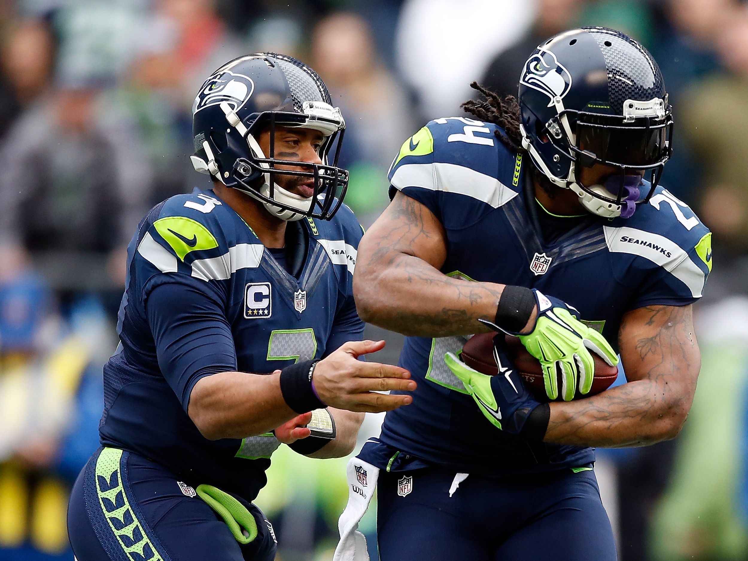 Seahawks' Marshawn Lynch, Russell Wilson can bring back playoff nightmares  for Packers in divisional matchup