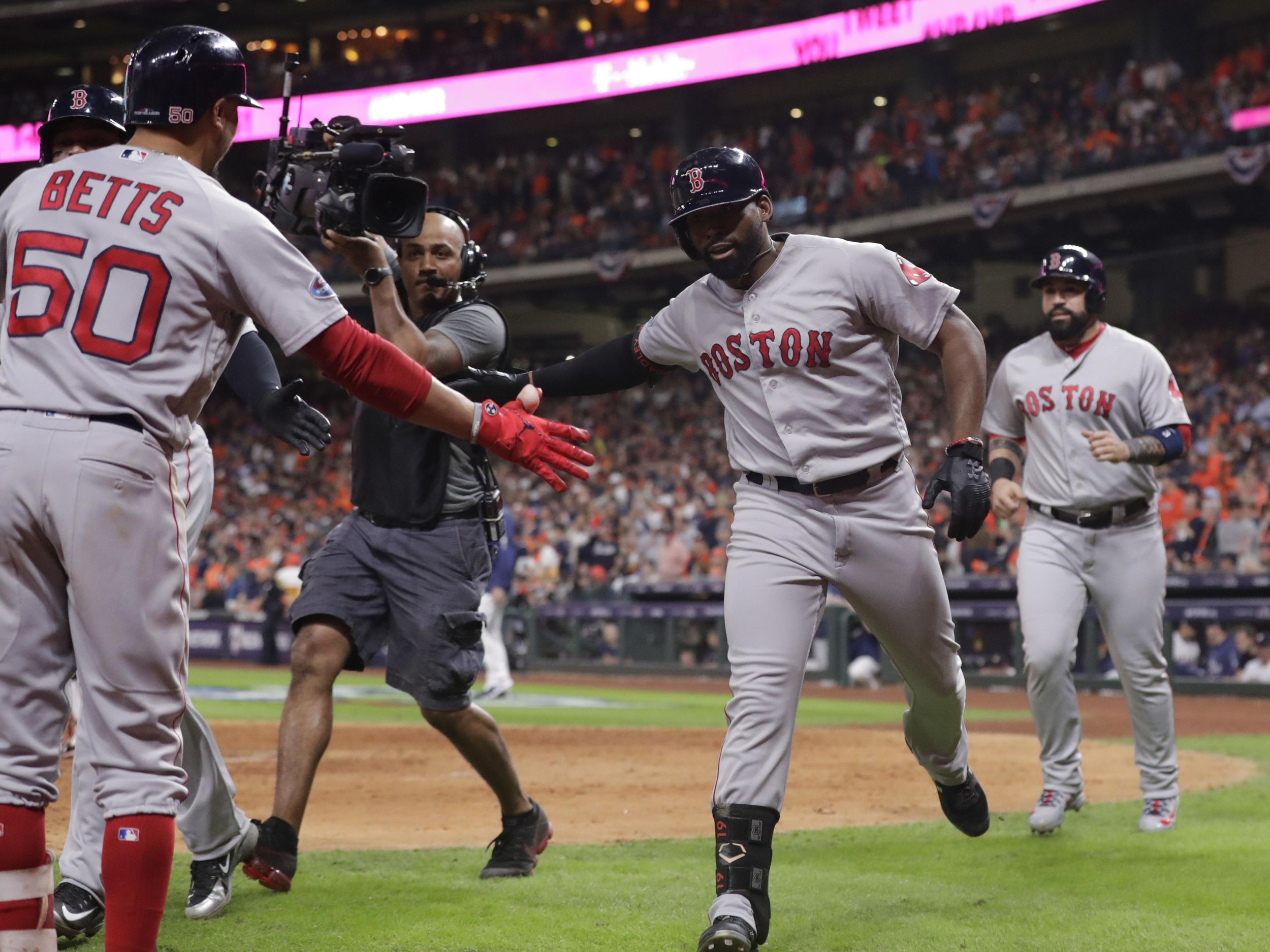 Altuve hit 3 homers, Astros beat Red Sox 8-2 in ALDS opener