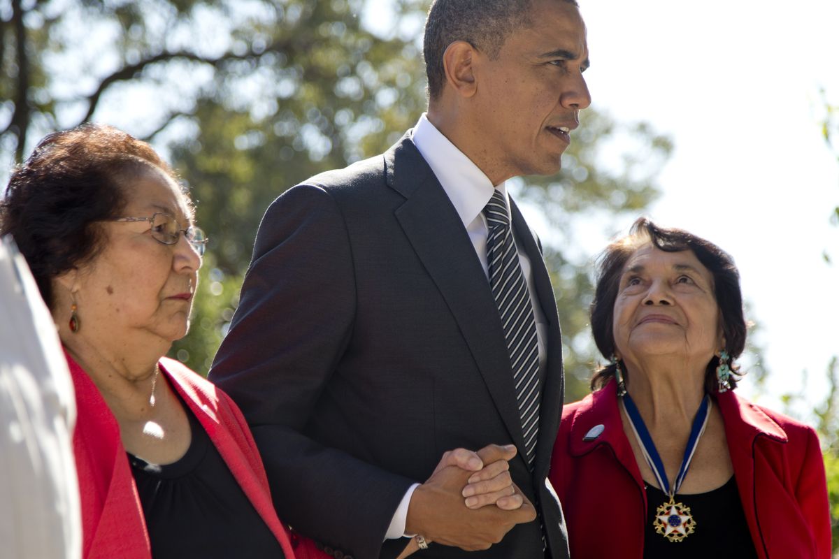 President Barack Obama walks with Cesar Chavez